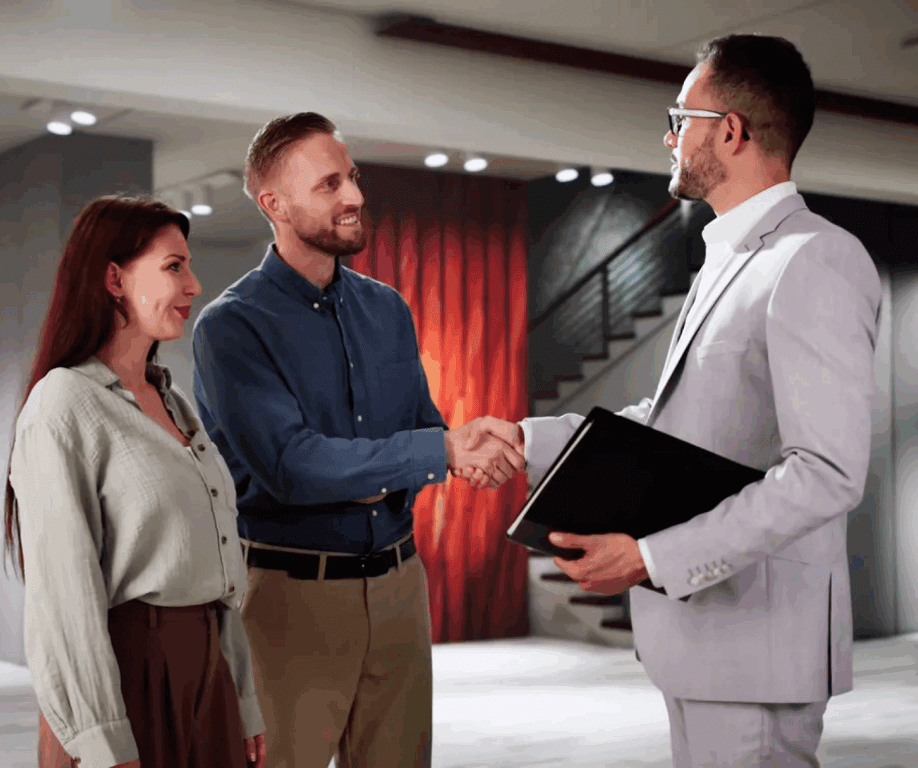 People shaking hands in a business meeting.