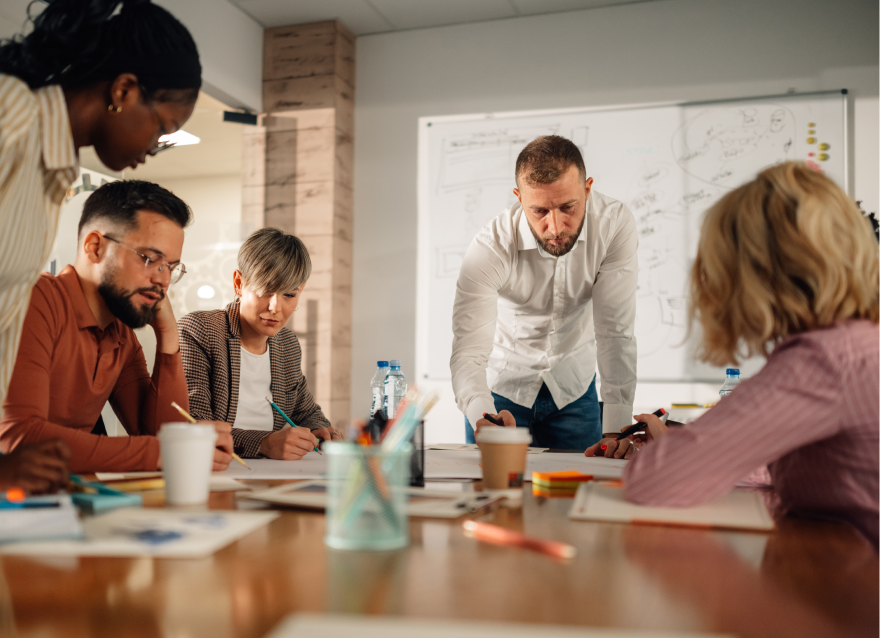 Team collaborating in a modern office setting.