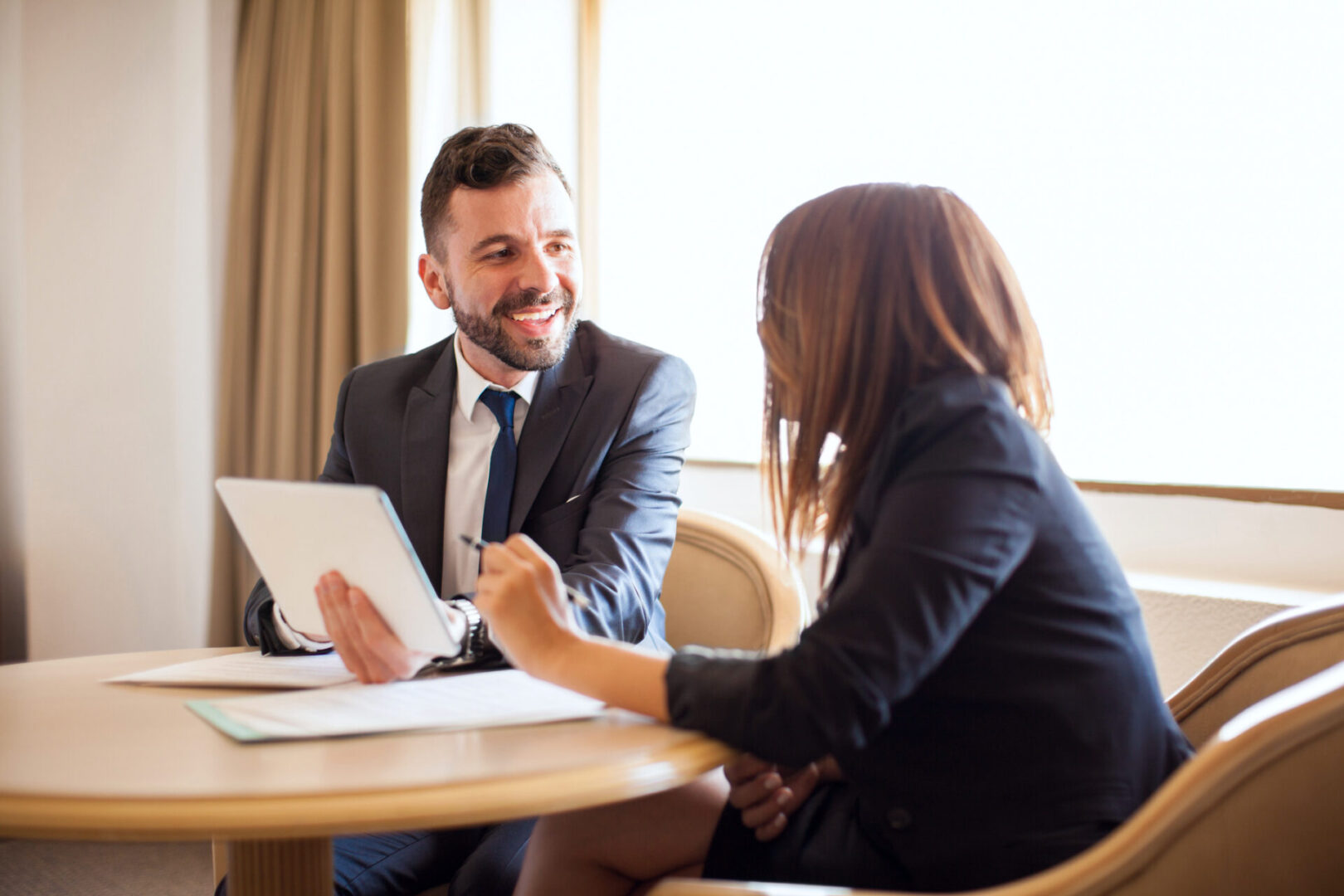 Man and woman having a business meeting.